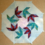 Plum Quilts Circling Swallows