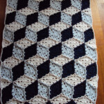 Tumbling Blocks Crochet Baby Blanket would Love To Figure This One Out